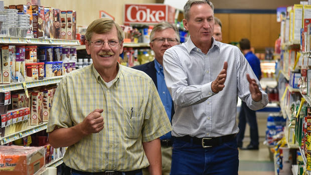 Governor Dennis Daugaard, right, takes a tour of A&M Market with owner Art Winsky while on tour of businesses in downtown Kimball on Wednesday. Kimball was selected as South DakotaÂ’s Capital for a Day by the Governor's office on Wednesday. (Matt Gade/Republic)